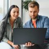 Couple looking at their mortgage options on their laptop